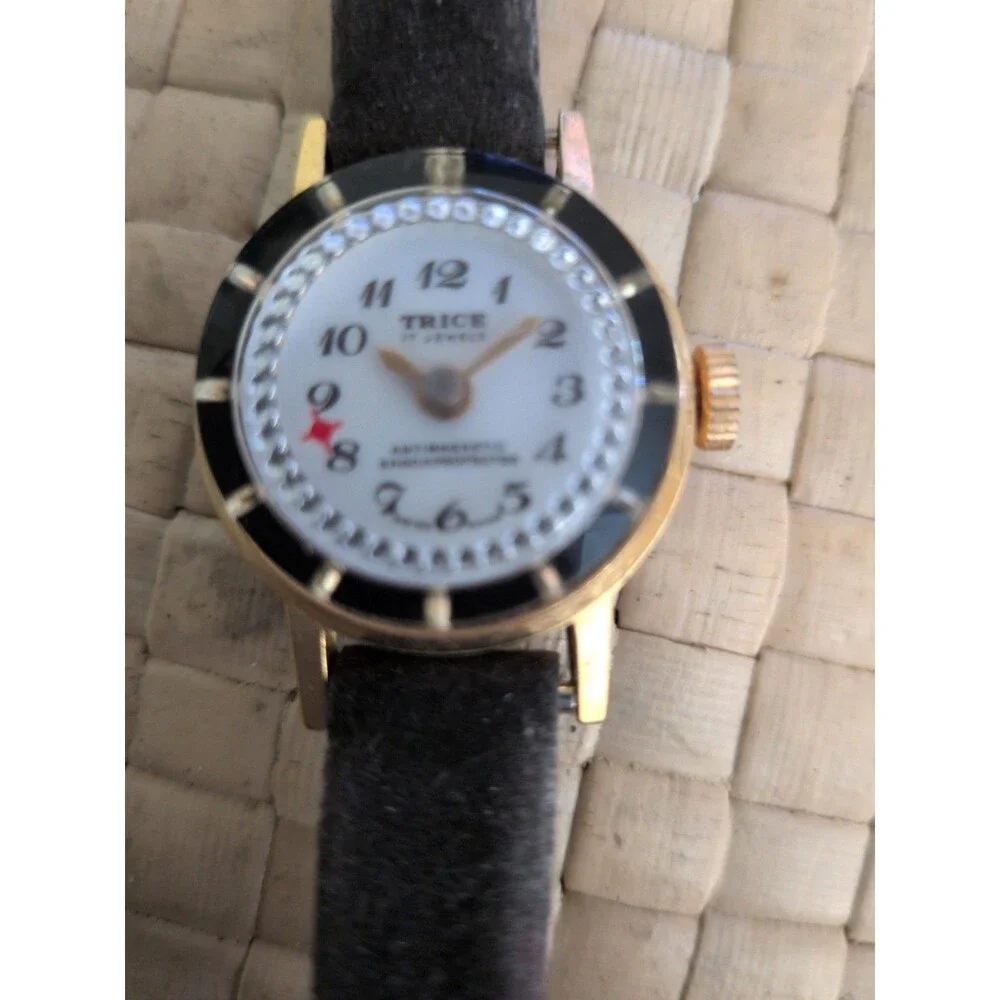 Trice Gold Tone White Dial 17 Jewels Blue Strap Vintage Watch